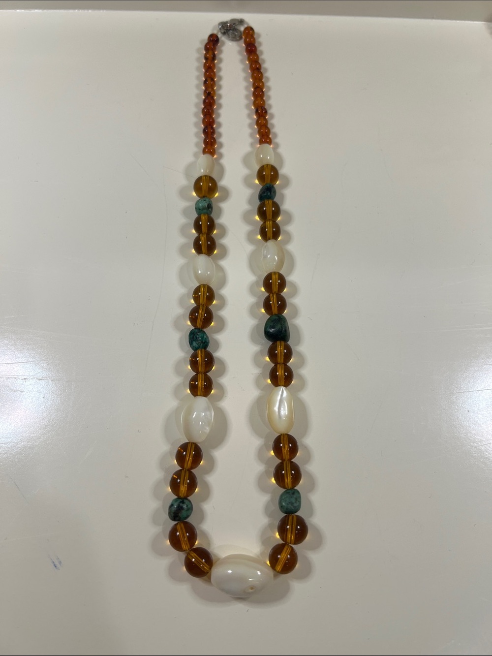 Amber and White Beaded Statement Necklace with Green Accents